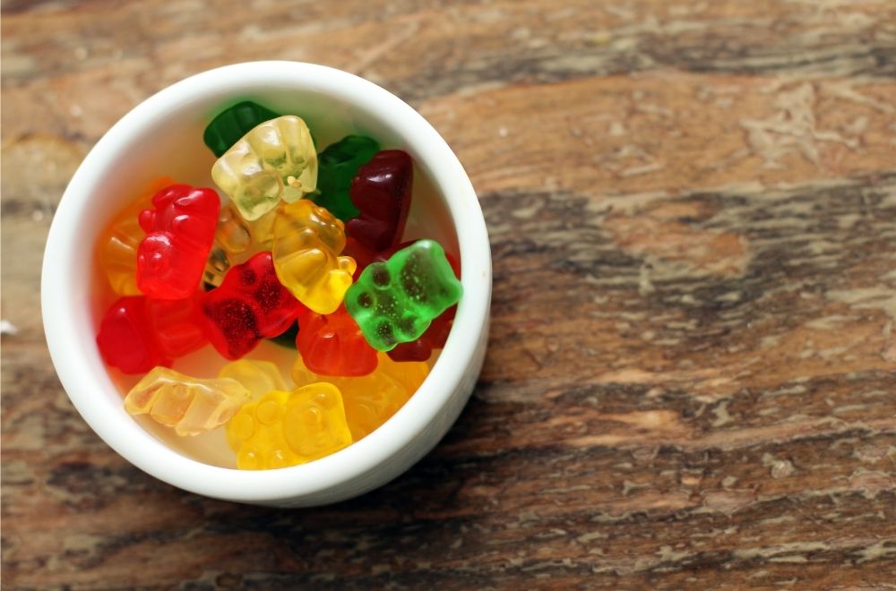 How do manufacturers ensure consistency in potency across batches of HHC gummies?